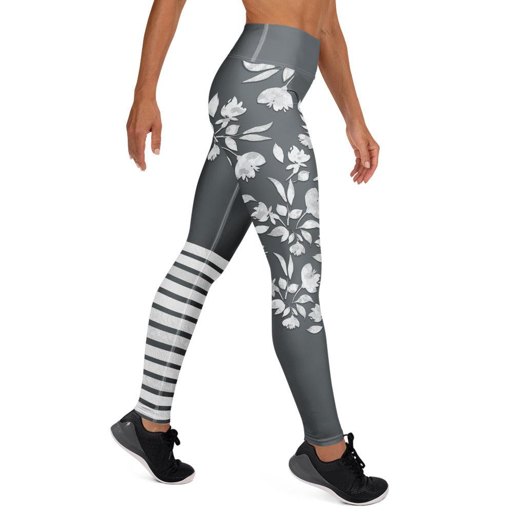 winter flower print leggings with white botanical blooms and sporty stripes