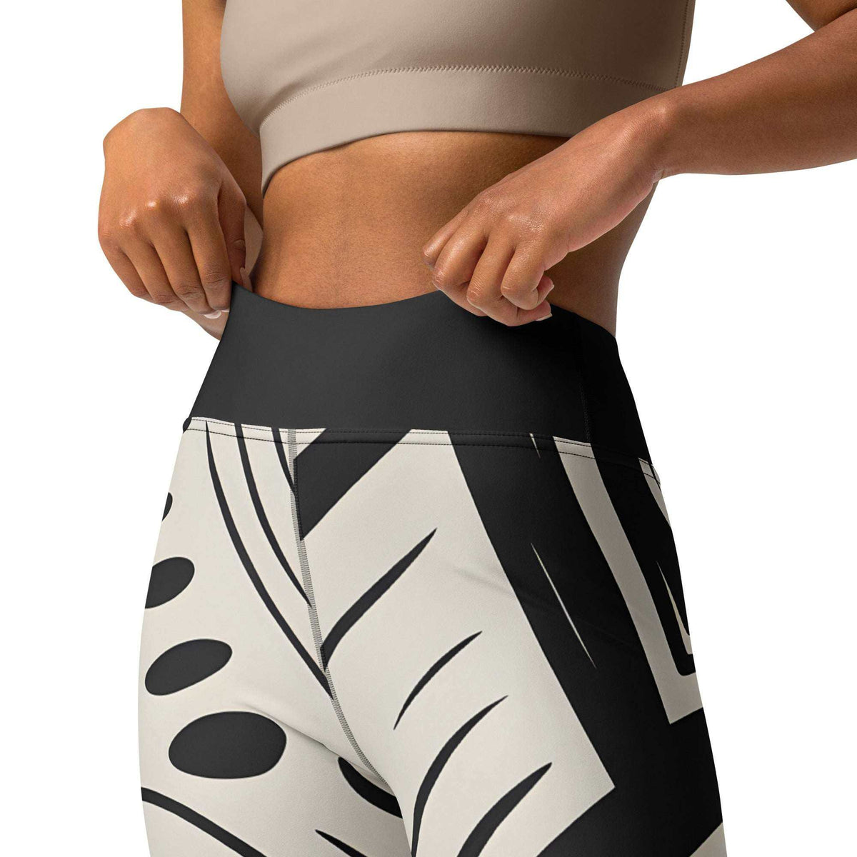 black and cream bold graphic leggings with abstract shapes and high-rise waistband
