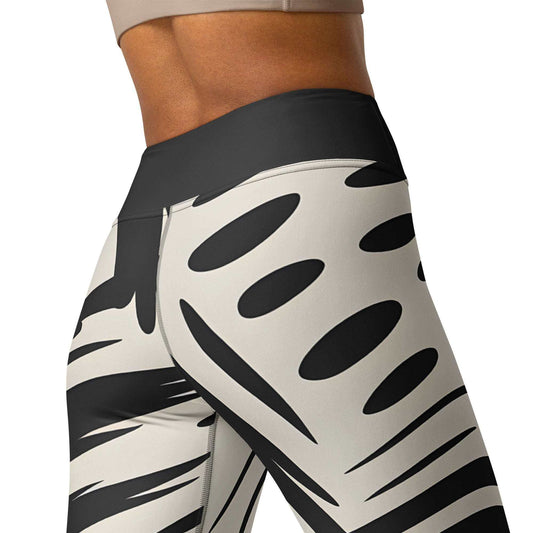 bold graphic leggings with black cream abstract design and high-rise waistband