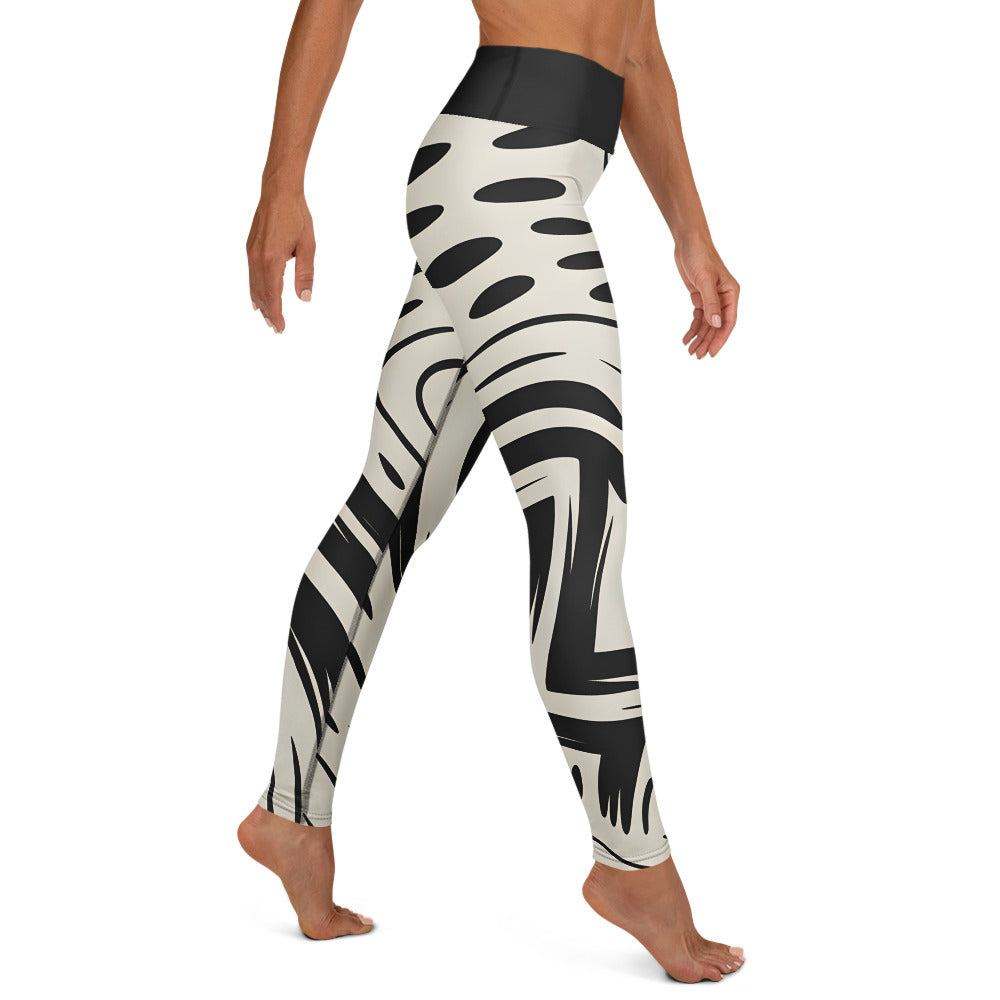 bold graphic leggings with black-and-cream abstract design and high-rise waistband