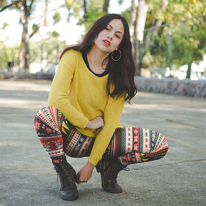Holiday party leggings with festive tartan and holly patterns