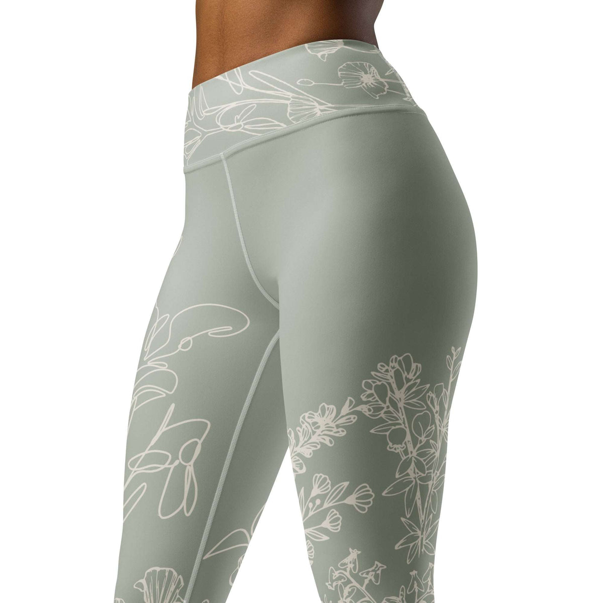 Sage Medows botanical print leggings with white floral design on sage green background