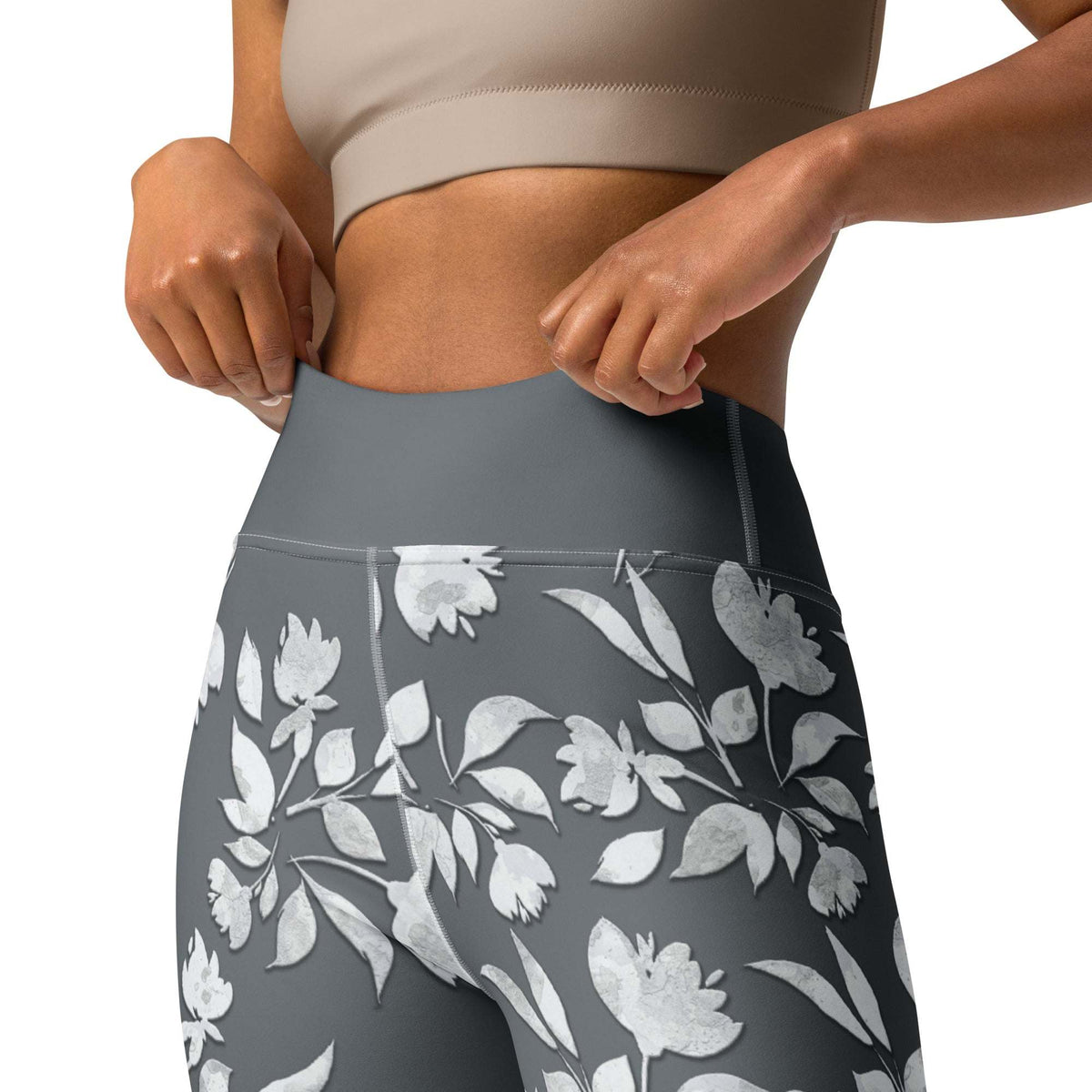 winter flower print leggings with white floral design on charcoal background