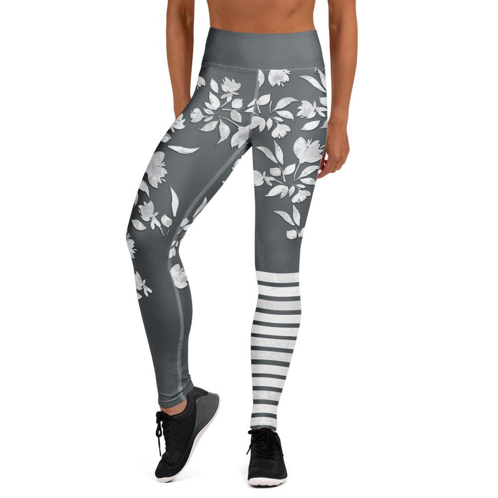 Winter flower print leggings with white botanical blooms and sporty stripes